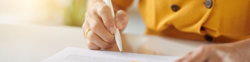 Preview: Woman Signing Agreement