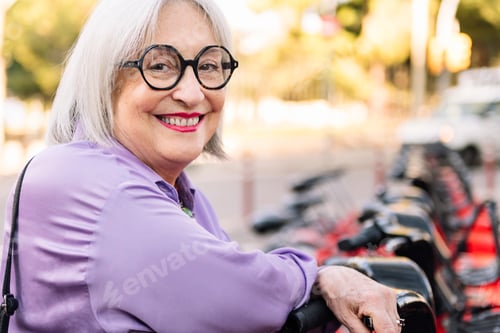 Preview: Smiling Senior Woman with Bike Share Program
