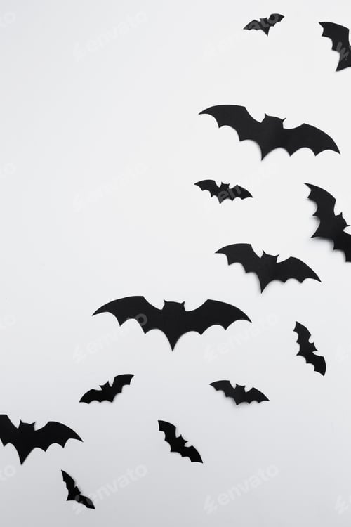 Preview: halloween and decoration concept - paper bats flying