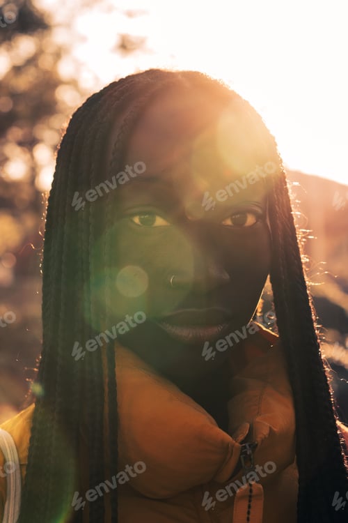 Preview: Close-up outdoor shot of a beautiful young and proud African woman