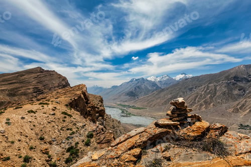 Preview: View of Spiti valley Himalayas with stone cairn . Spiti valley, Himachal Pradesh, India