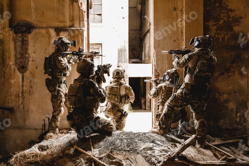 Preview: Expert team of soldiers with weapons attacking enemy