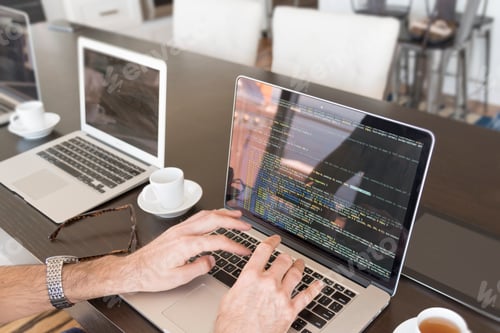 Preview: Writing computer coding language hands keyboard