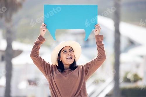 Preview: Getting her message out there. Shot of a young woman holding a speech bubble.