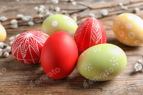 Preview: Colorful painted Easter eggs on wooden table