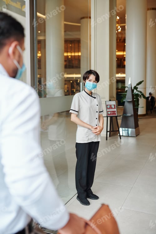Preview: Hotel concierge greeting gues