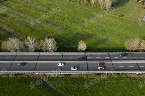 Preview: Aerial view of a stretch of highway, travel between nature and speed
