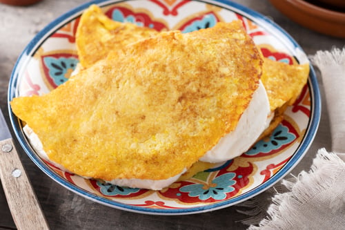 Preview: Traditional Venezuelan beef cachapa on wooden table