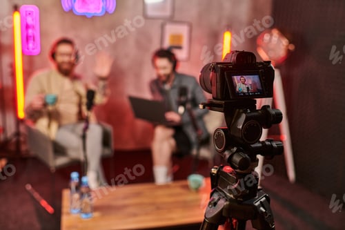 Preview: Men Recording a Podcast in Studio