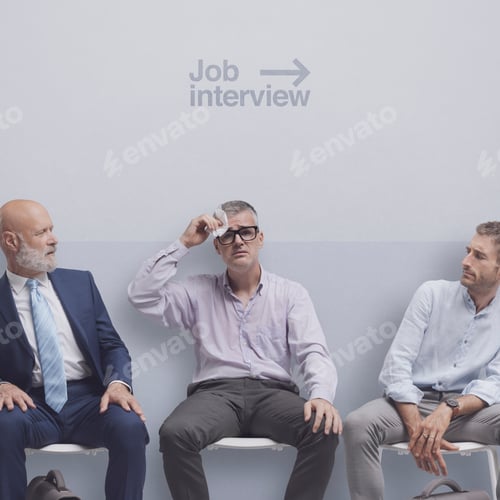 Preview: Men Awaiting Job Interview Seated in Waiting Room