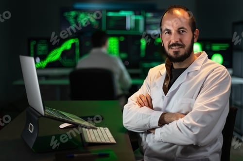 Preview: Portrait of happy scientist doctor wearing white coat in the office, looking at camera. Copy space.