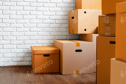 Preview: Close up of moving carton boxes in an empty room