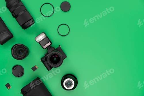 Preview: Green background table with some photography props.