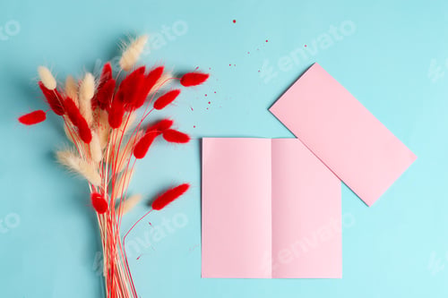 Preview: Bifold mock-up pink paper brochures on a yellow background