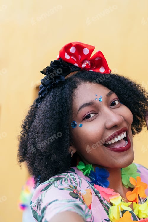 Preview: Portrait of an afro woman enjoying carnival in the streets