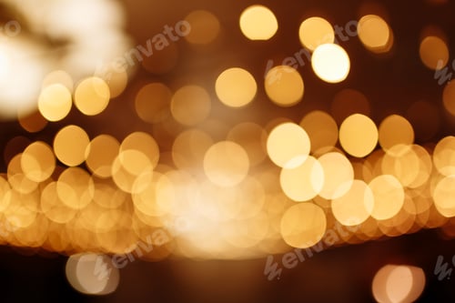 Preview: Christmas gold background. Festive abstract background with bokeh defocused lights