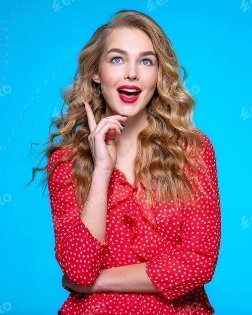 Preview: Young Woman with Idea Posing on Blue Background