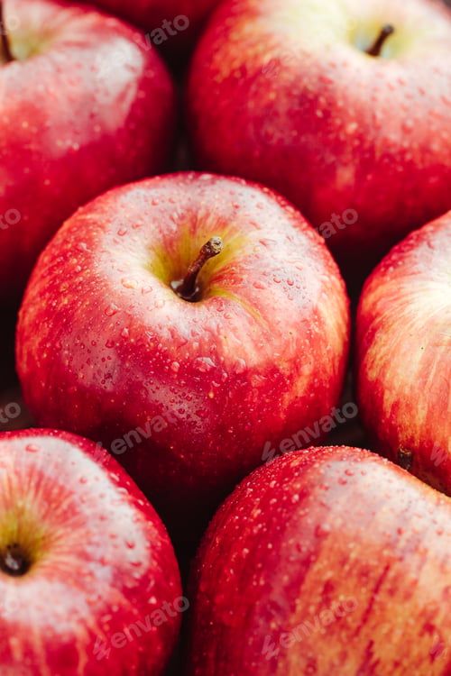 Preview: Harvest of ripe apples variety Red Delicious. Food background, macro photography.