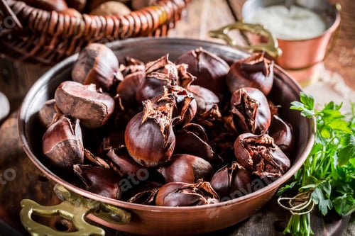 Preview: Closeup of homemade chestnuts with garlic sauce