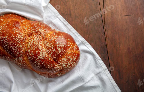 Preview: Easter sweet bread, homemade tsoureki braid on white table cloth