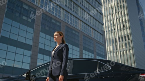 Preview: Posh businesswoman posing downtown sunny morning. Elegant woman manager standing
