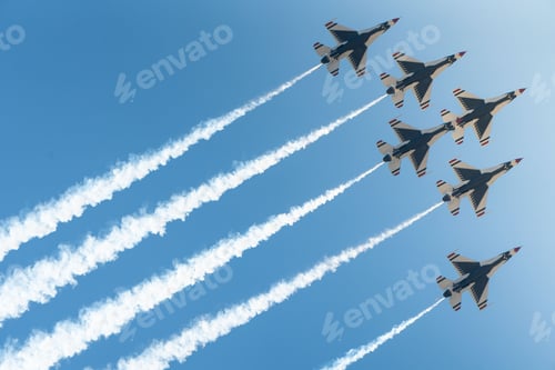 Preview: Parade of military aircrafts flying in a sky