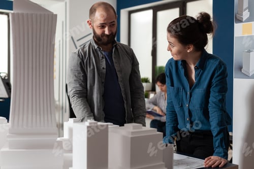 Preview: Architect work team talking at professional office