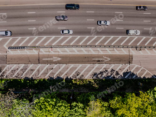Preview: Aerial view of cars passing through an intersection