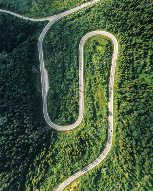 Preview: Flight over the summer mountains with mountain road serpentine