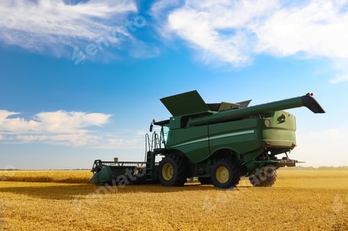 Preview: Modern combine harvester working in agricultural field