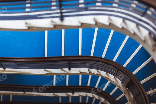 Preview: Old blue spiral staircase, spiral stairway inside an old house in Budapest, Hungary. Project