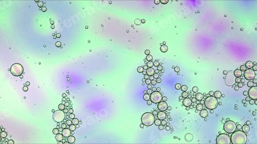 Preview: Abstract Colorful Food Oil Drops Bubbles and spheres Flowing on Water Surface