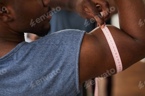 Preview: Measuring Arm Circumference with Tape Measure in Gym