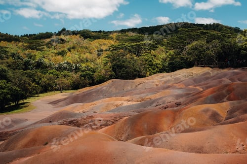 Preview: Seven colored earths in Mauritius, nature reserve, Chamarel. The green forest is behind us.Mauritius