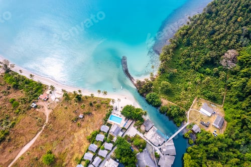 Preview: Beautiful tropical sea beach with palm forest and resort in summer
