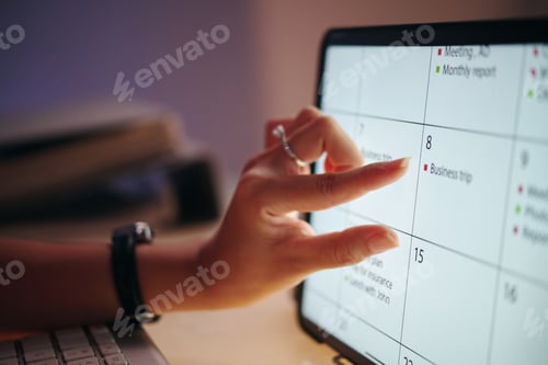 Preview: Reviewing Calendar Plans On Digital Tablet