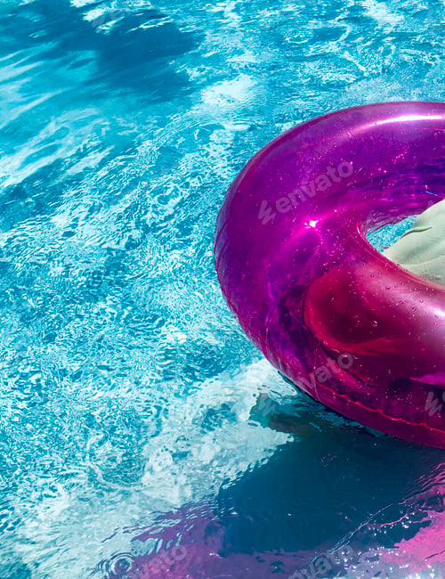 Preview: Pink inner tube in pool