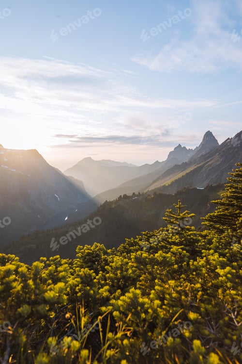 Preview: Sun flare over Winchester Mountain, North Cascades, Washington, USA