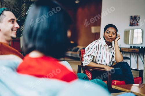 Preview: Curious black lady listening to friends