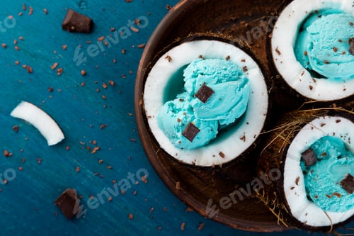 Preview: Blue ice cream in coconut bowl.