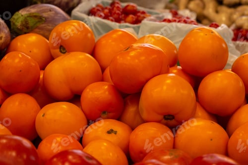 Preview: Basket Of Orange Tomatos Are Available For Sale At Asheville North Carolina Farmers Market