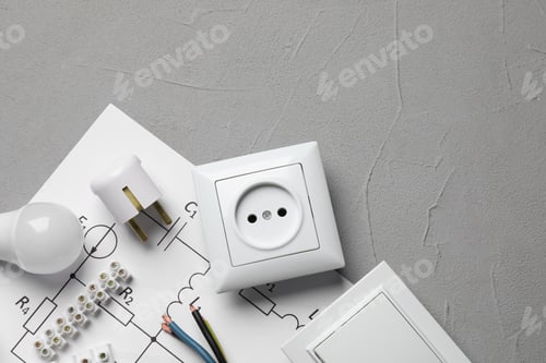 Preview: Flat lay composition with electrician's accessories on grey background, space for text