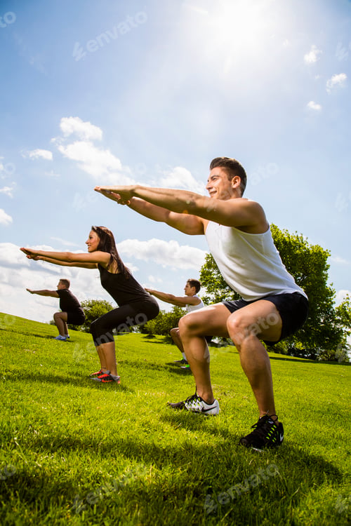 Preview: Personal trainers doing outdoor training in urban place, Munich, Bavaria, Germany