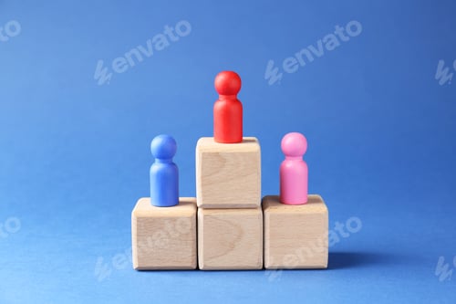 Preview: Competition concept. Human figures on wooden cubes against blue background