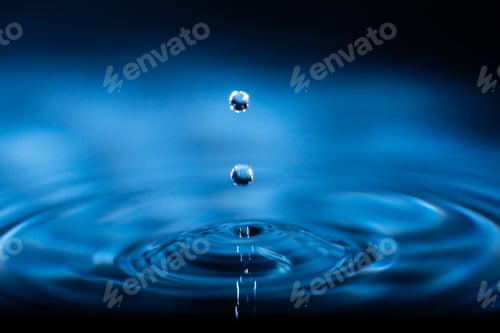 Preview: abstract background of blue water splash falling drop on liquid wave