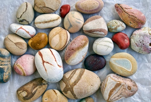 Preview: Group of colorful stones with different pattern polished by the sea