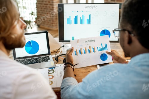 Preview: Coworkers working together with analytics