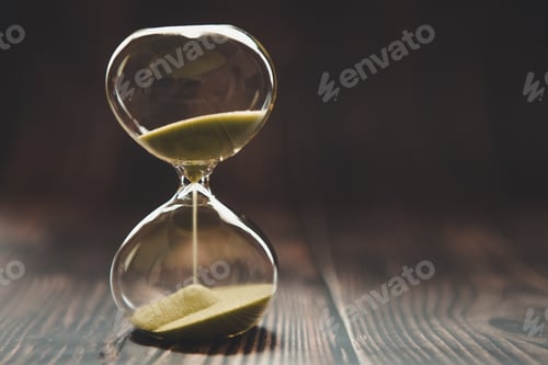 Preview: Hourglass with falling sand inside a glass bulb