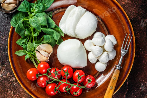 Preview: Mozzarella cheese, basil and tomato cherry ready for cooking Caprese salad.