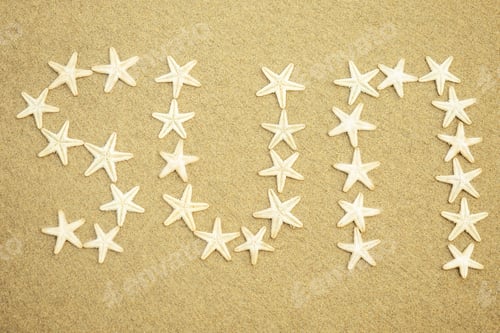 Preview: white starfish inscription of the word sun on the sand.